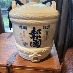 Japanese Ceramic Saki Jar With Rope Handle - About 12” tall and 12” wide