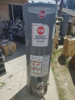 RHEEM 29 GALLON WATER HEATER FREE INSTALL & HOSES