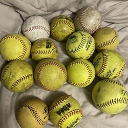 14 Softballs. ( Used )