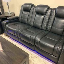 Party Time Midnight Reclining Sofa And Loveseat$10 Down Payment And Financing Available