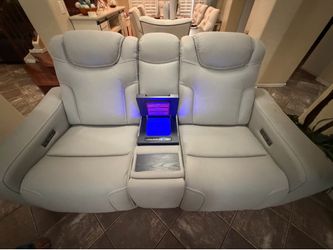 Alton leather power reclining sofa with power headrest and cooling unit in excellent condition