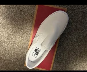 White slip on Vans