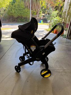 DOONA STROLLER (NEVER USED) MIDNIGHT EDITION + COMPLETE ACCESSORY PACKAGE — $675 OBO
