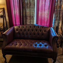 Pivoted Leather Loveseat 