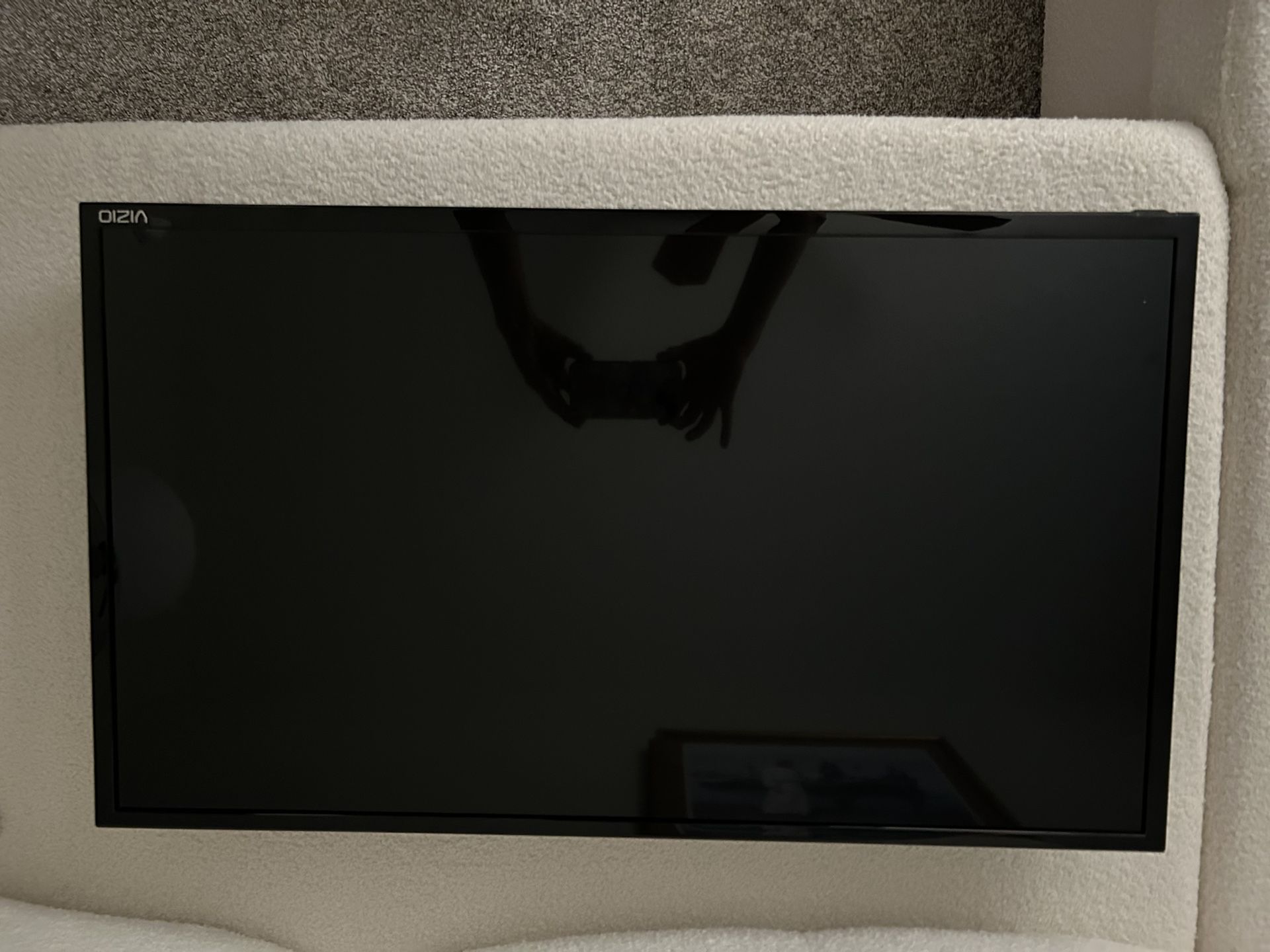 30” TV with wall anchor and remote 