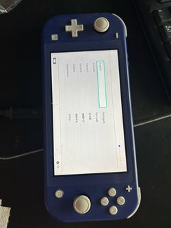 Nintendo Switch Lite - Blue. Works great screen is not scratched but has a gummy texture on it, but Doesn’t impact it when turn on Used Nintendo Swit