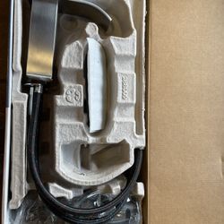 BRUSHED NICKEL BATHROOM FAUCET and SHOWER HEAD. 