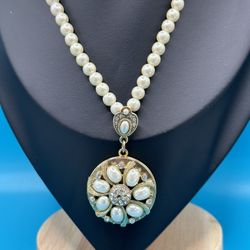Vintage 1928 Faux Pearl Locket Necklace 28” Long Pendant Is 2 1/4” Long Gold Tone Good Condition 