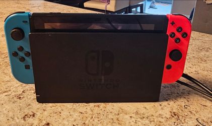 Nintendo switch console with dock and cables