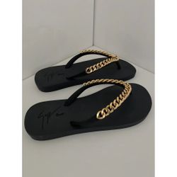 Giuseppe Zanotti Black Flip Flops with Gold Chain Detail