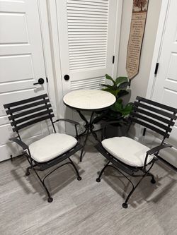 Pottery barn mosaic table and chairs