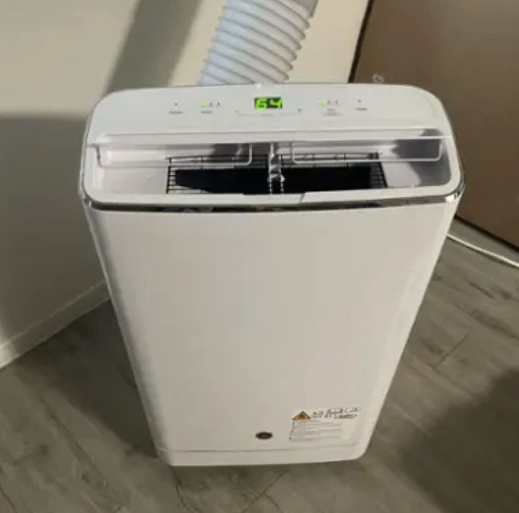 GE - 550 Sq. Ft. Portable Air Conditioner ( Uses Free Air ! )