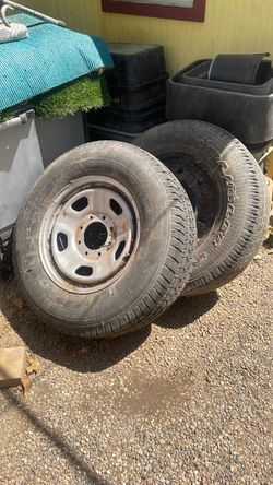 Two tires and rims 275 70 18 265 70 18