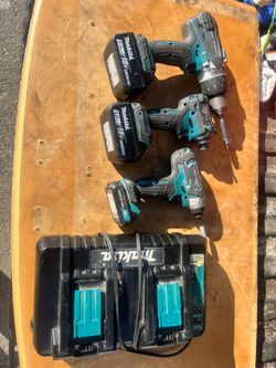 Makita set drill and impact 18v and double battery charger impact 12v