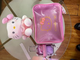 Set de hello kitty peluche cosmetiquera y un kit de facial para la Cara