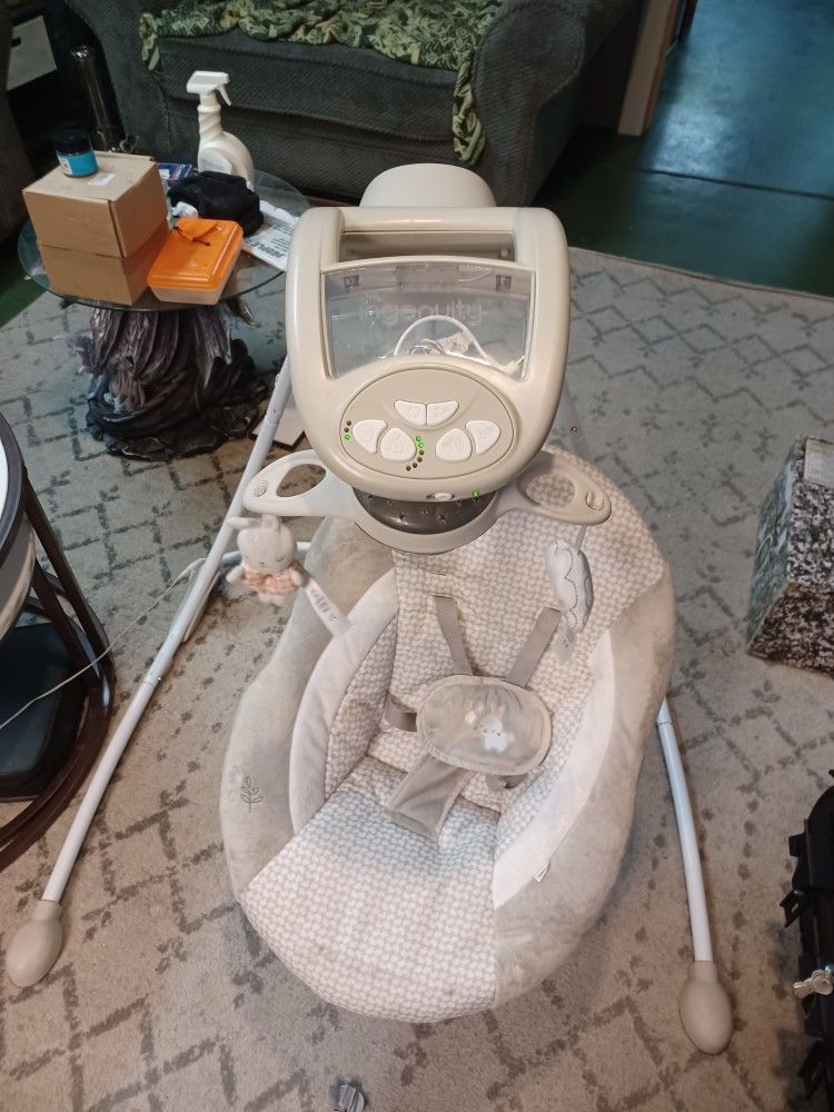 Ingenuity InLighten Soothing Baby Swing.