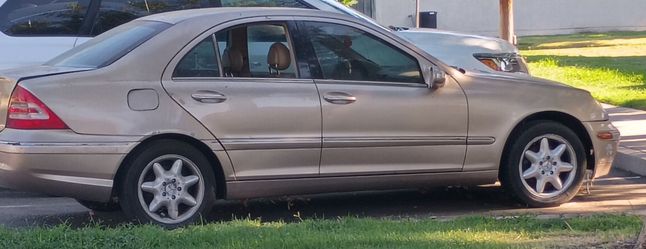 02 Mercedes-Benz c240 beige four-door six cylinder