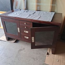 Nice Entertainment Center With Glass Shelfs, Most See. With Granit Top