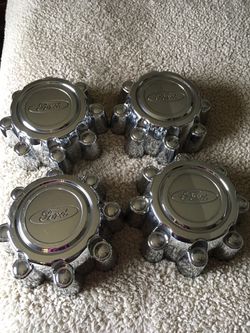 Original Center Caps, fits SuperDuty and Excursion also May fit other 8 Lug models. Not an aftermarket