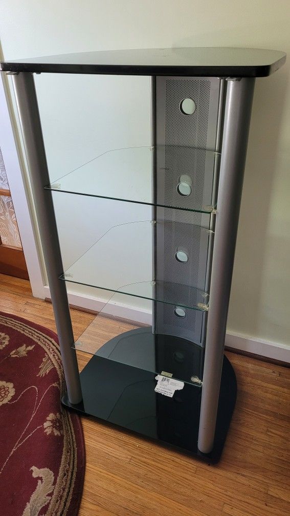 Grey and black metal and glass stand