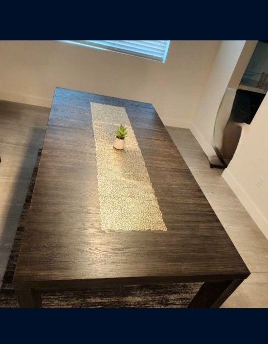 Ashley's Extendable Dining Table Seats Up To 8 People (Possibly 10 Small Chairs)