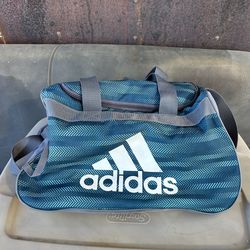 Small Adidas duffle bag.  Dimensions in pics.  Good Condition!