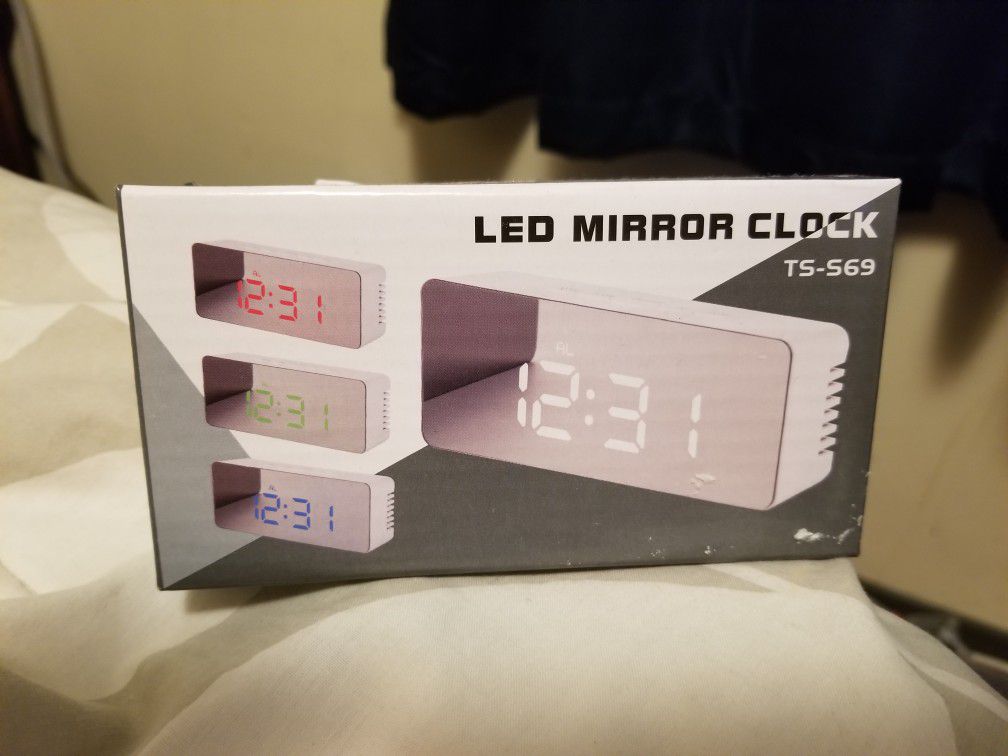 Mirror alarm clock