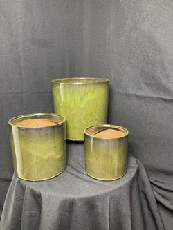 Tropical Green Ceramic Planters-Glazed Ceramic Cylinder Pots. L-8”wide x 8”tall $20 M-6.50”wide x 6.50”tall $15 S-5.25”wide x 5.25”tall $10 Pick up