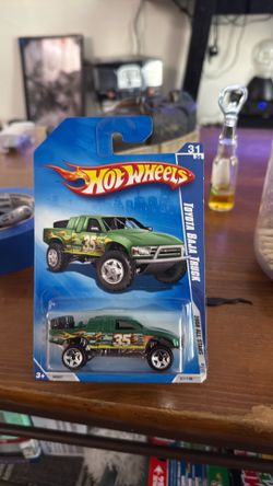2009 Die Cast Hot Wheels Ages 3+ Toyota Baja Truck
