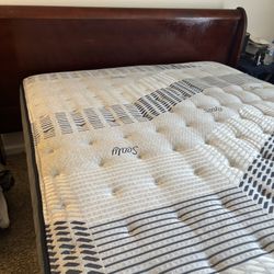 Six month old Sealy mattress with frame headboard