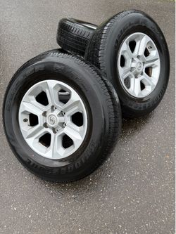5th Gen Toyota 4 Runner SR5 wheels with Bridgestone Dueler H/T P265/70R17 Tires.