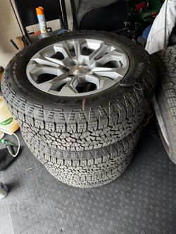 Rims with tires and lug nuts