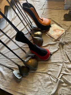 Various used golf clubs for sale