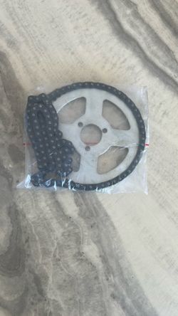 Sprocket and chain set for machinery. Two sets.