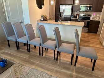 Six Matching Tufted Dining Chairs
