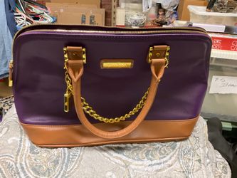 Joy and Iman purple purse
