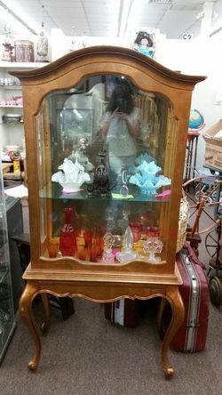 Antique lighted curio cabinet