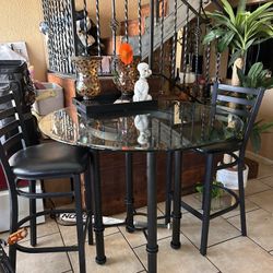 Tall Table And 2 Stools.  $160 