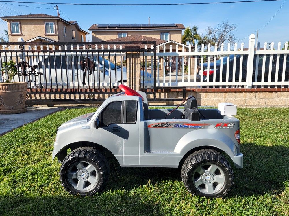 Fisher Price Power Wheels Ford F150 Truck
Gray