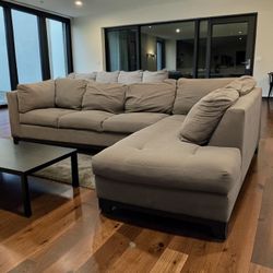 Dark brown l-shaped sectional with Chase