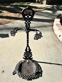 Antique cast iron umbrella stand