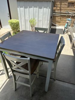 Square table with four chairs