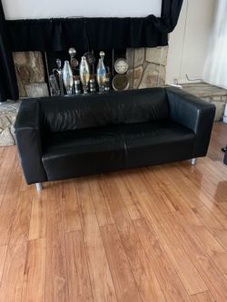 Black modern leather couches