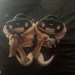 lanvins the strap on the tongue i cut it off because my brother drawed sharpie on it