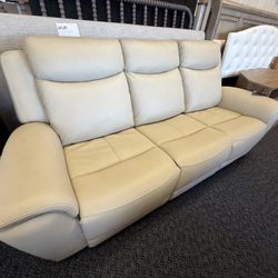 Brand new beige leather electric sofa w/ adjustable headrest