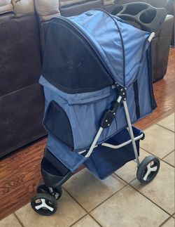 Small/ Medium 3 wheel pet stroller ( like new) ! very clean and from non smoking home!