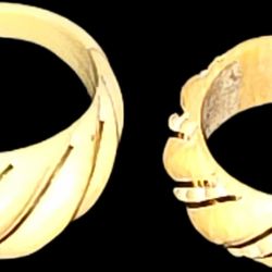 pair of His And Hers carved ivory bone + 14k Gold Acc. rings with a spiral design. 