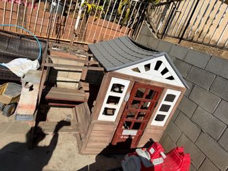 FREE KidKraft Outdoor Wooden Kids Playhouse