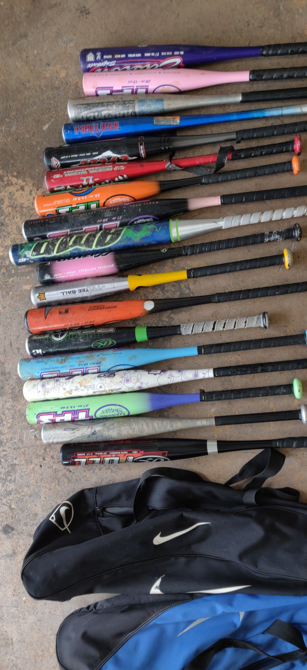 Baseball bats assorted with Nike bags