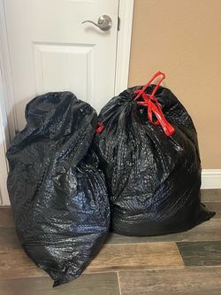 Two large bags of women’s clothing
